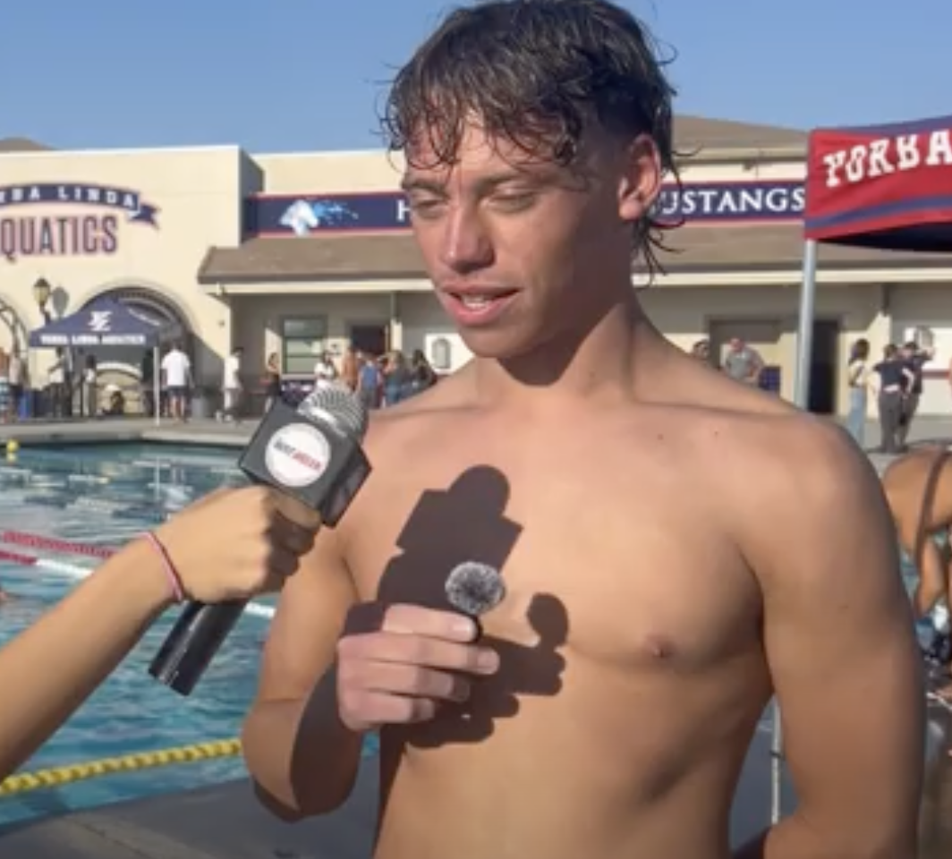 Chloe Chang interviewing Max Mikus after an exciting win against rivals, Esperanza.